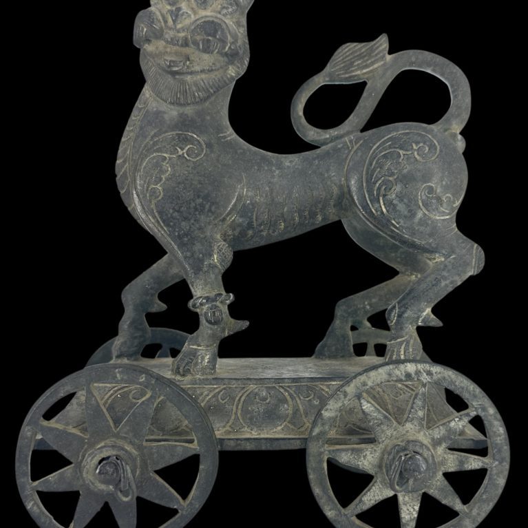 BRONZE YALI ON WHEELS