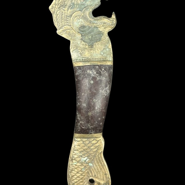 BRONZE AND WOOD BOTTLE OPENER WITH LION MOTIF