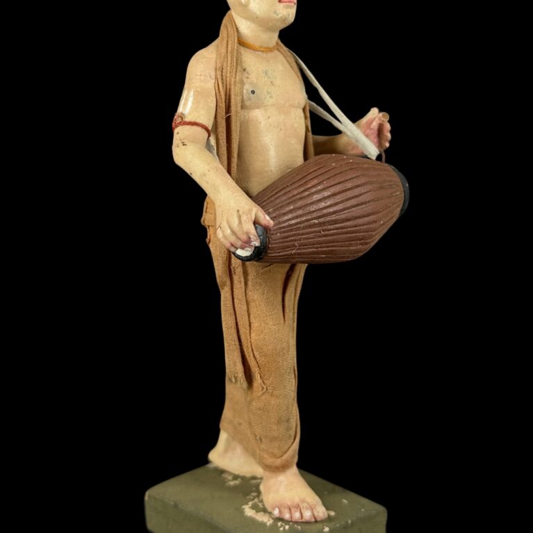 DEVOTIONAL MUSICIAN WITH MRIDANGA
