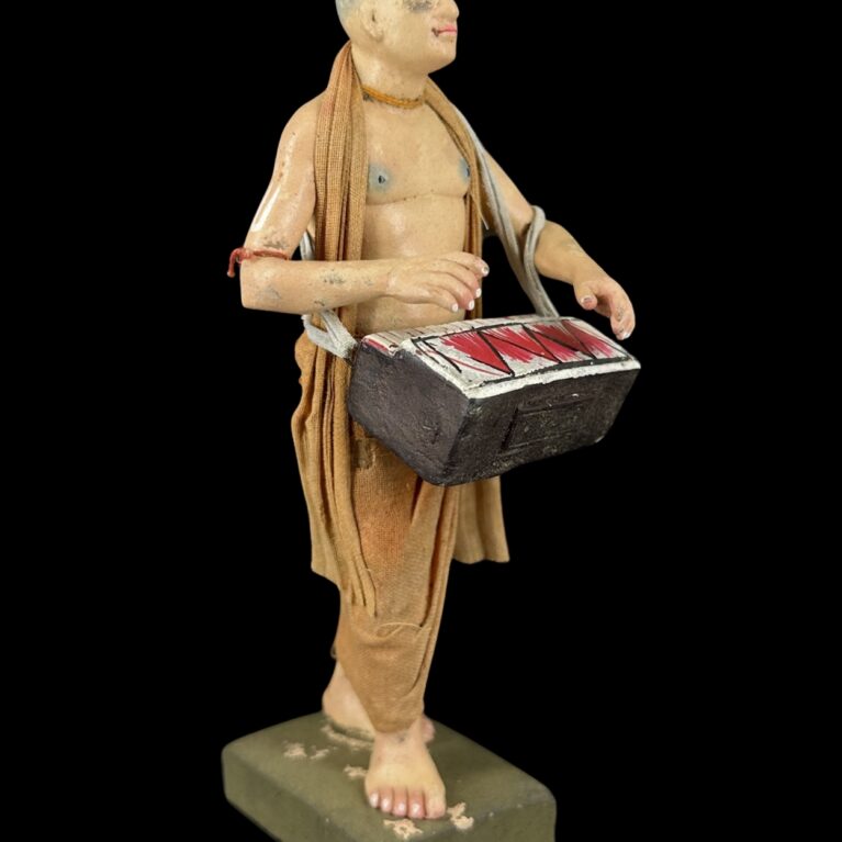 VAISHNAVA DEVOTEE WITH HARMONIUM