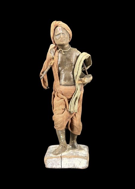 VILLAGE MAN WITH TRADITIONAL ATTIRE