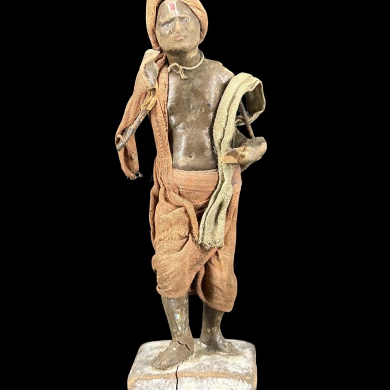 VILLAGE MAN WITH TRADITIONAL ATTIRE