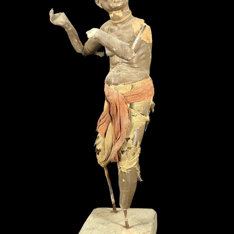 ELDERLY MENDICANT IN MOTION