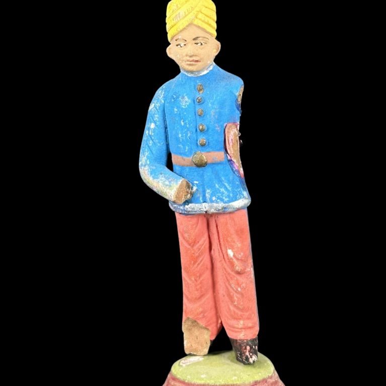 ROYAL ATTENDANT IN CEREMONIAL DRESS