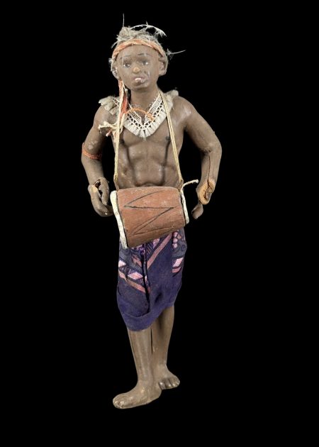 YOUNG TRIBAL DRUMMER