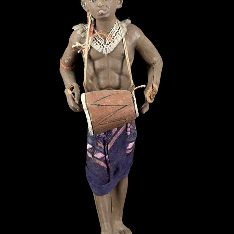 YOUNG TRIBAL DRUMMER