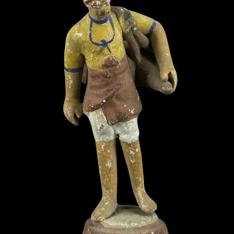 VILLAGE MAN WITH BAG