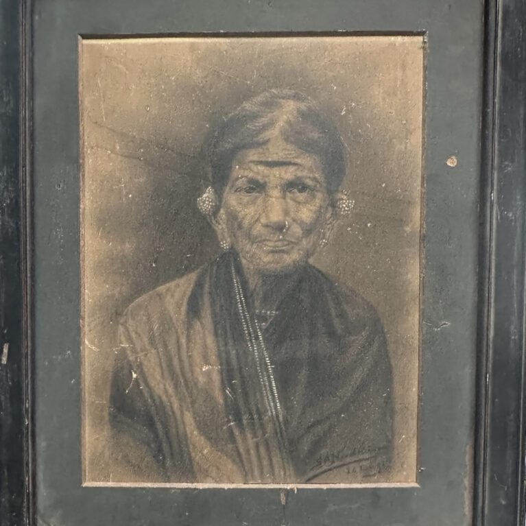 PORTRAIT OF AN ELDERLY INDIAN WOMAN