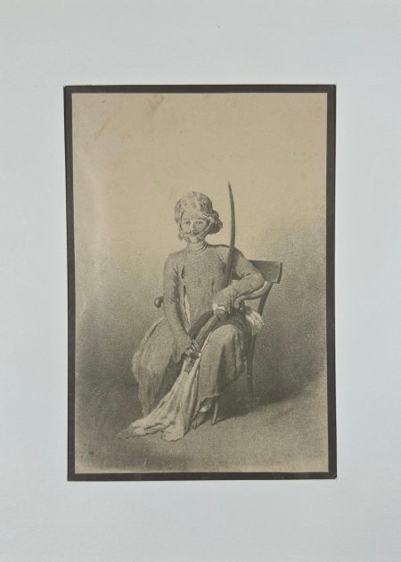 A SEATED INDIAN SWORDSMAN