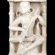 SEATED DEITY SCULPTURE WITH ARCHITECTURAL FRAME