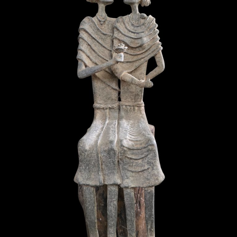 STONE SCULPTURE OF SEATED COMPANIONS