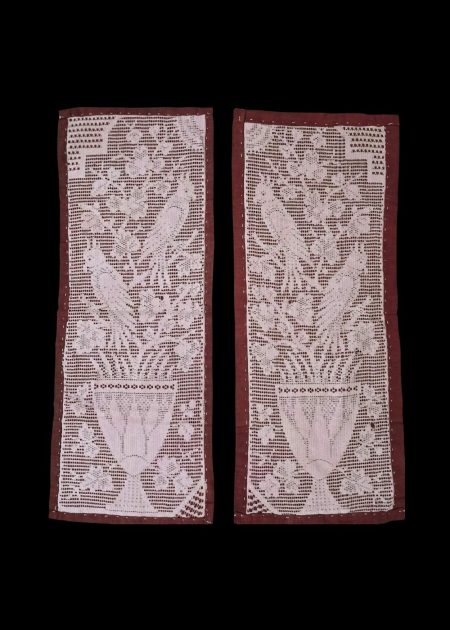 LACE PICHWAI BEAUTIFULLY FEATURES A DESIGN OF BIRDS AND A FLOWER POT